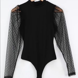 Sheer sleeve body suit